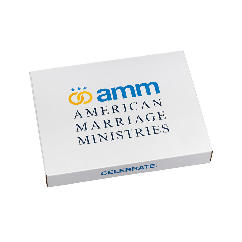 Photo of the outside of the Handfasting kit. A white box with the AMM logo 