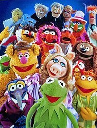 The Disney's Muppet cast of characters, all posed and looking at the camera