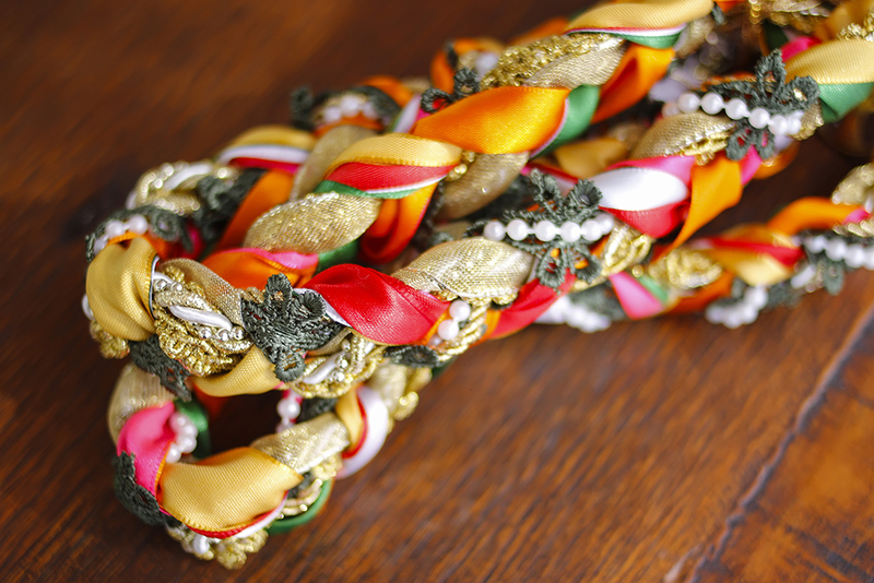 Colorful handfasting cord made from smaller braided cords for a handfasting wedding ceremony