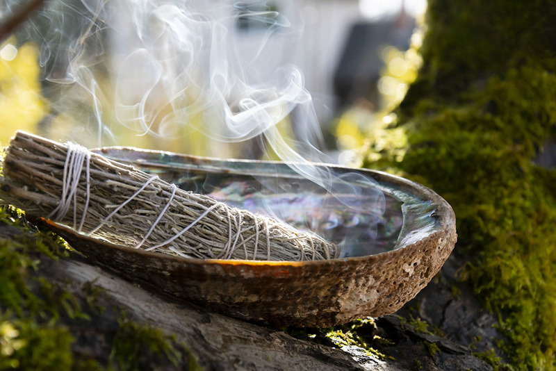 CLose up of a smudge stick used in native american wedding prayers and smudging rituals