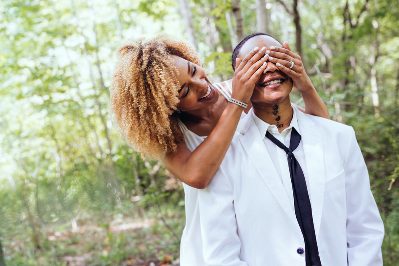 A happy couple prepares for the wedding day first look during a minimony.