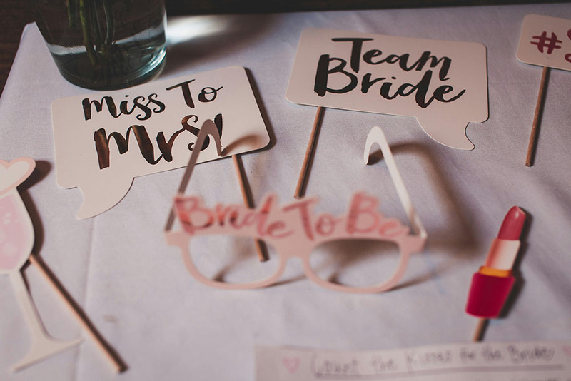 Fun items on a table for a bridal shower or bachelorette party