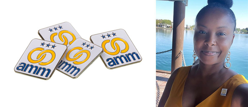 Amm lapel pins and a photo of Raquel with the AMM lapel pin