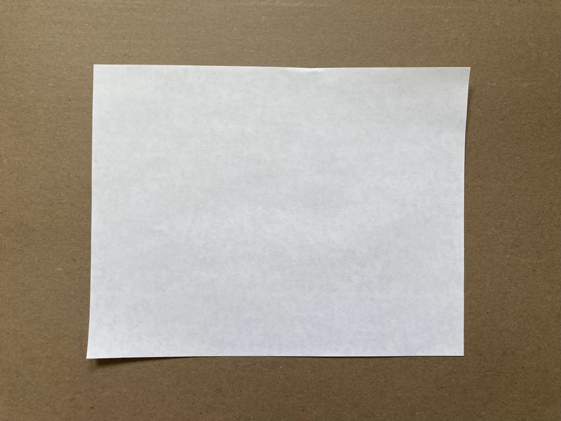 zine making instructions, this shows a piece of paper on the table