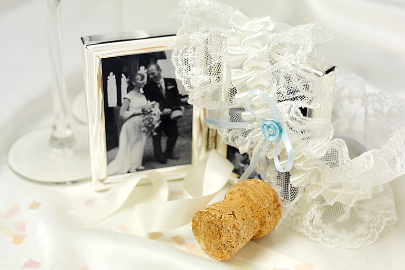 momentos of family members displayed on a table at wedding