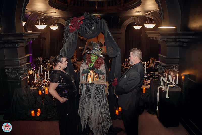 Photo of BORAH officiating a wedding in Salem, bride and groom dressed in black