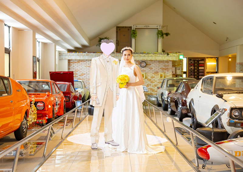 Bride sits with her fictional character during their symbolic ceremony