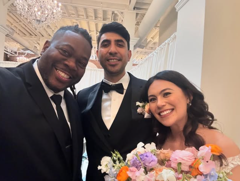 Officiant Chris with newlyweds at The Estate on Second