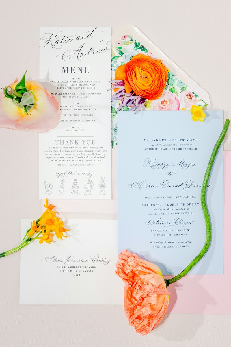Wedding stationary, including wedding invitation, and flowers