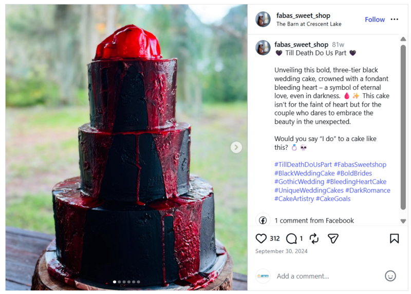 Instagram screen shot of a large black cake with a bloody "heart" on top