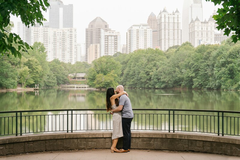 couple embrace while eloping in piedmont park, atlanta