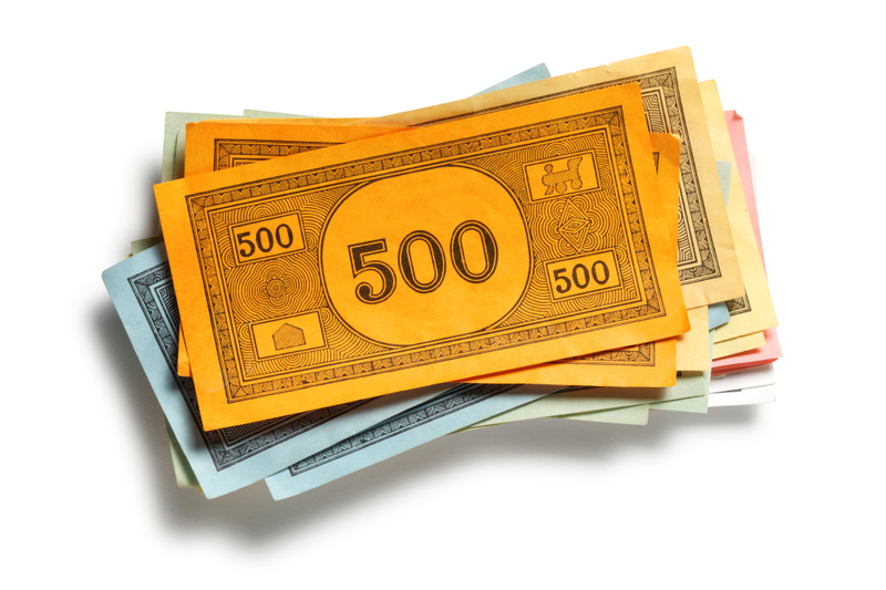 planning a december wedding but what about taxes, image of money about tax filing for newlyweds