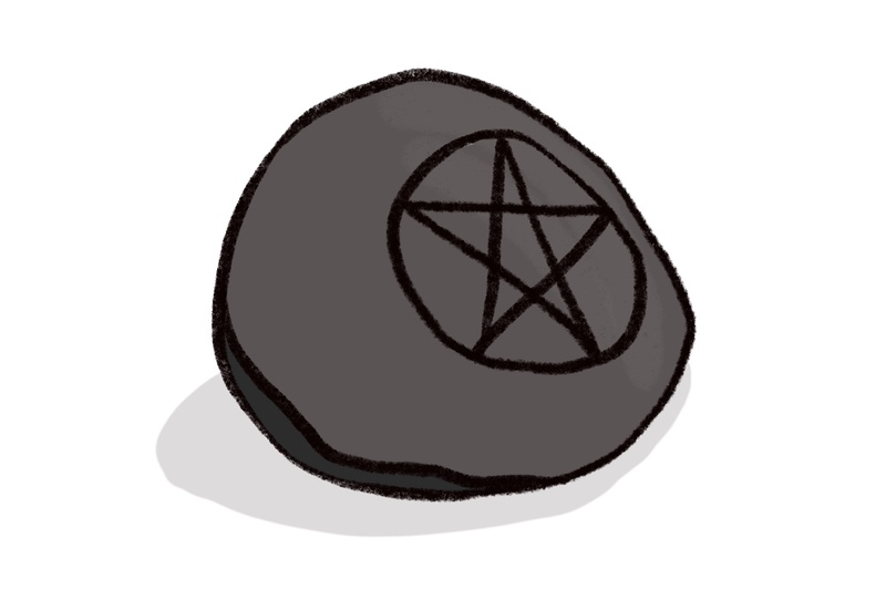 Illustration of a stone with a carved pentagram for use in a Wiccan or Pagan wedding ritual.