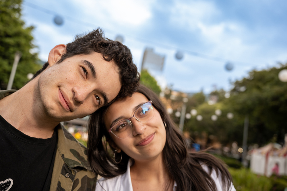 A young couple pose together in love