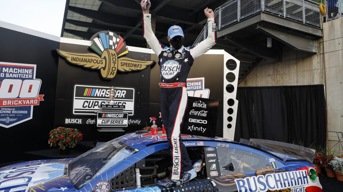 Harvick takes advantage of Hamlin’s crash to win Brickyard