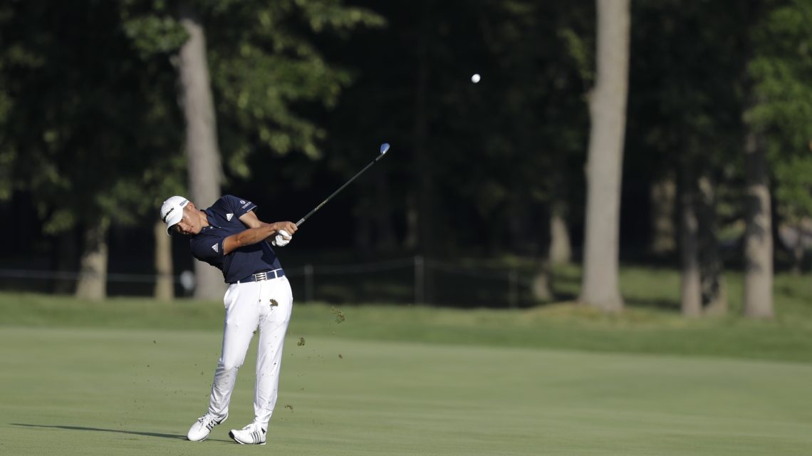 Morikawa builds big lead at Muirfield Village before storms
