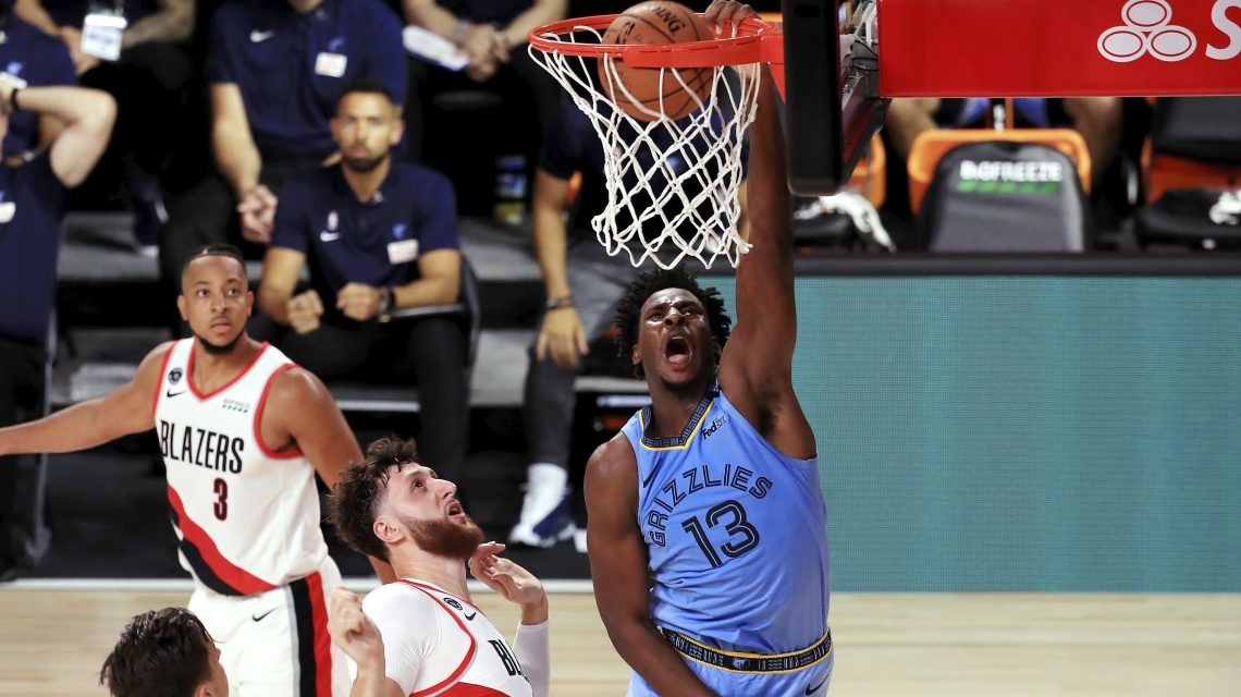 McCollum, Lillard help Blazers get past Memphis in OT