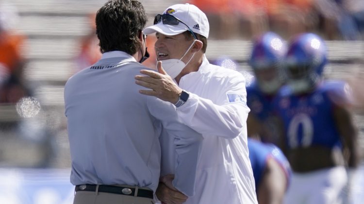 Kansas coach cleared of virus but skips West Virginia game