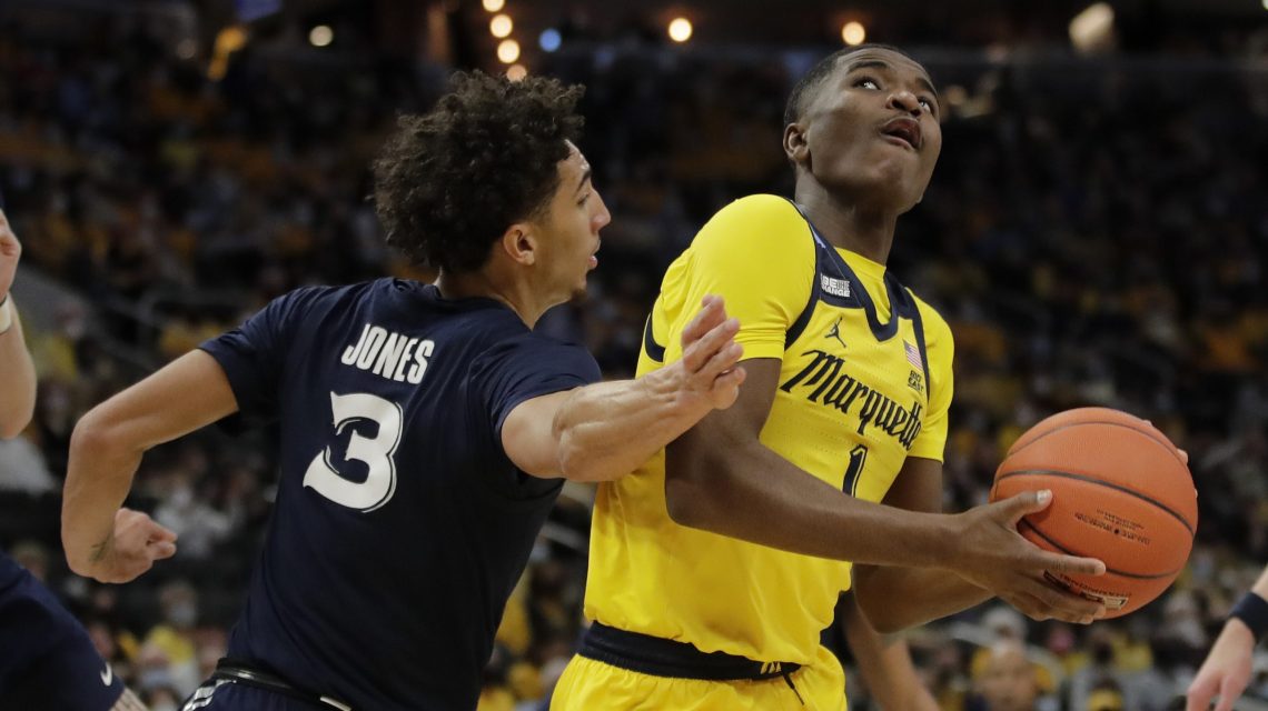 Kam Jones leads Marquette over Georgetown, 77-66