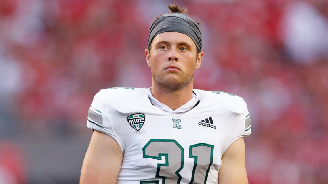 After leaving soccer in high school, EMU punter Jake Julien getting shot in the NFL