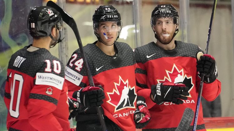 Canada wins at worlds after fire delay, US beats Britain