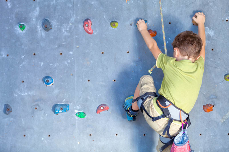 boy climbing shutterstock