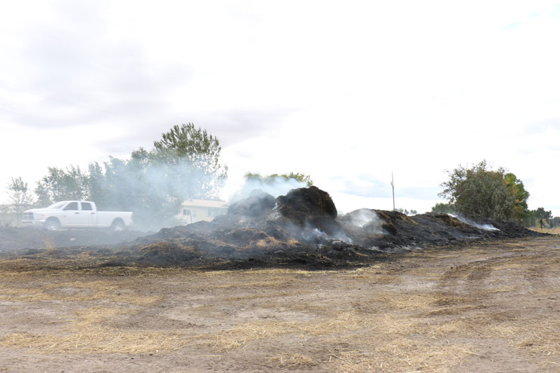 Ririe haystack fire continues to smolder East Idaho News