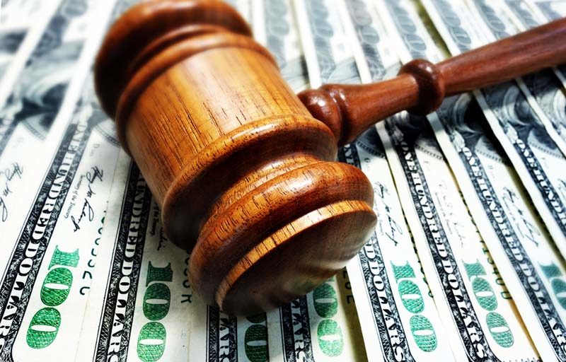 money gavel court bills shutterstock