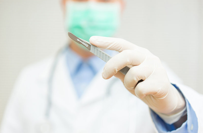 doctor scalpel surgery shutterstock