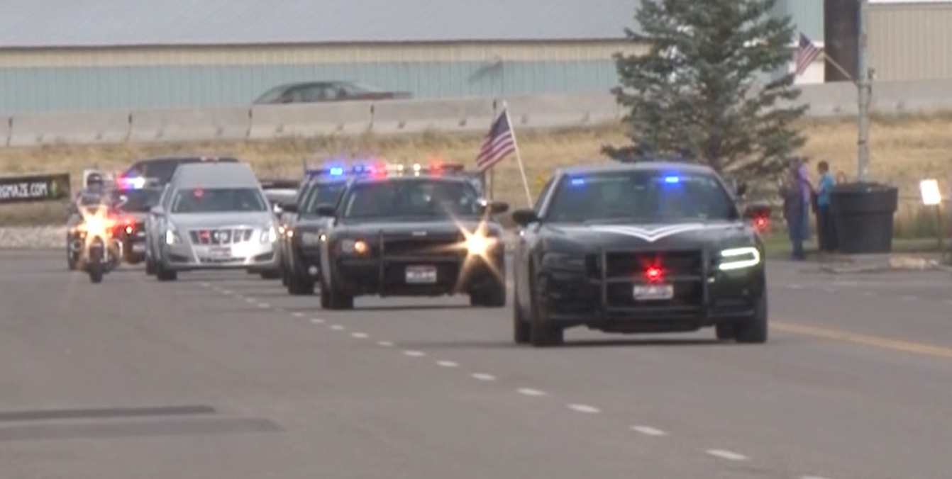 Community honors Rigby Officer Bill Gray as his body is escorted home