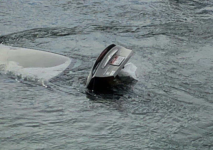 car in river
