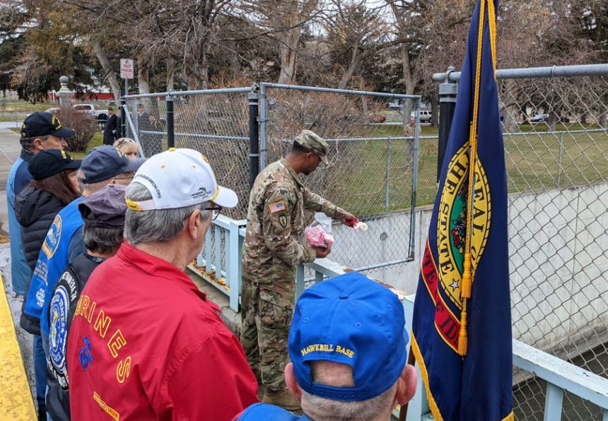 Rose petals dropped off the Pearl Harbor Memorial Bridge in Pocatello