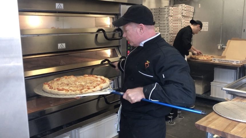 crawford making pizza