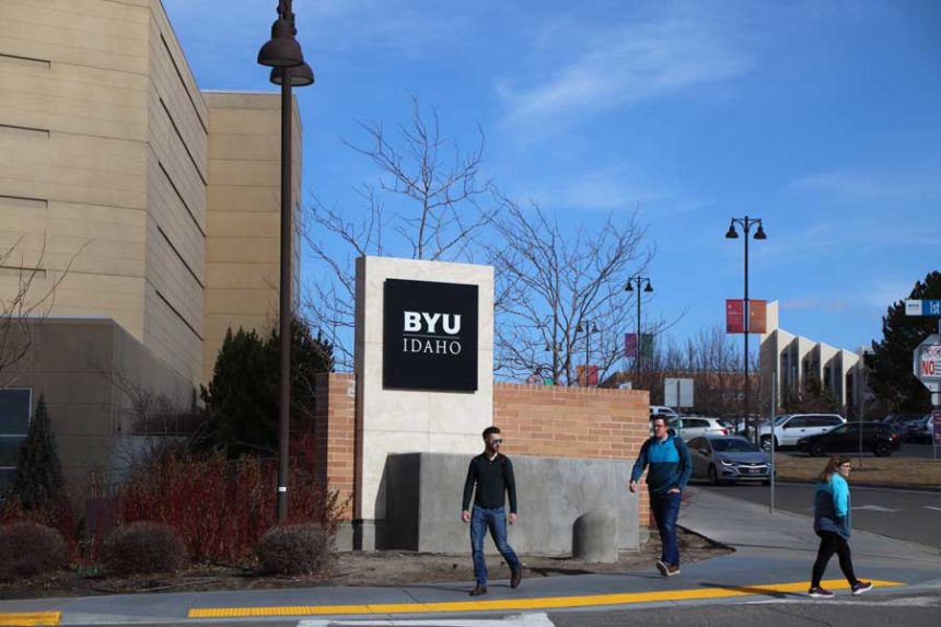 Brigham Young University-Idaho people walking at a crosswalk.