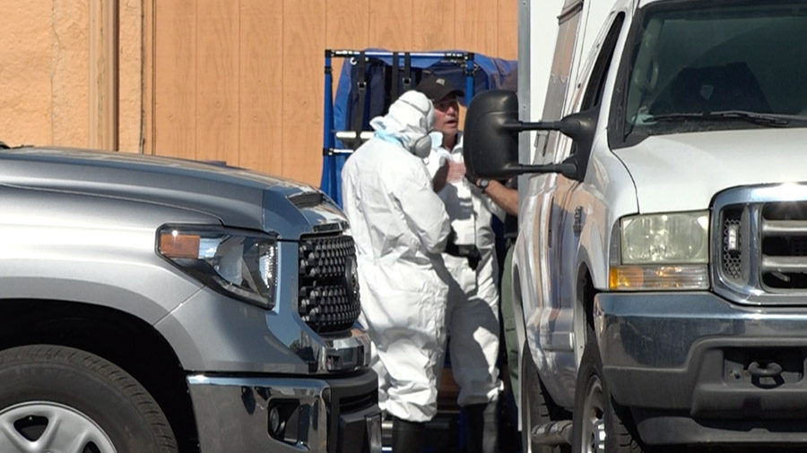 Investigators at Downard Funeral Home