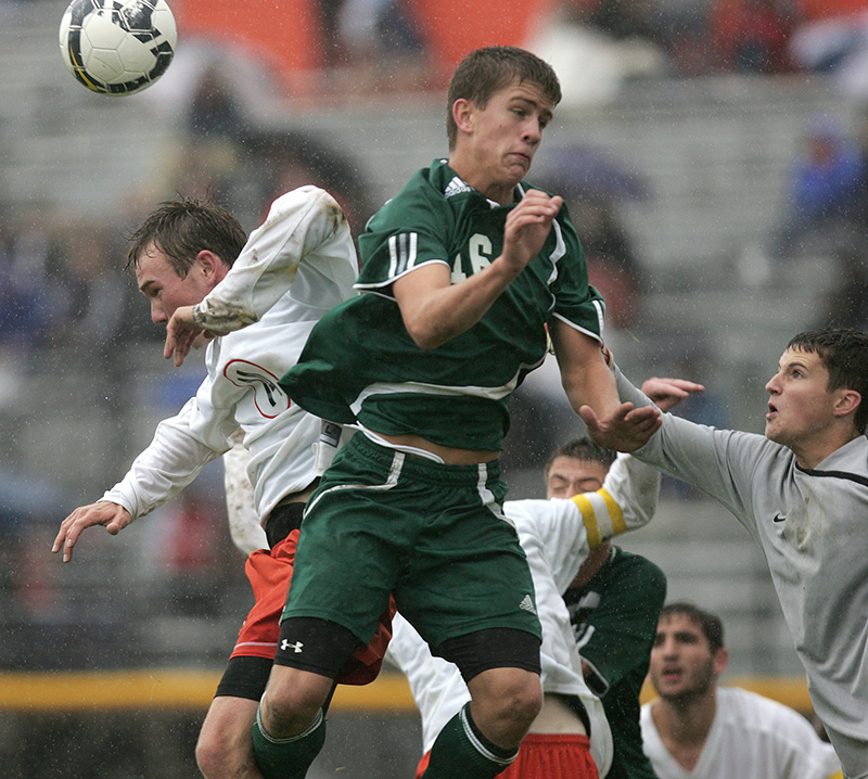 St. Charles Easts Alex Cairns collides with Waubonsies Jason OBrien during the final moments of their 2-1 loss on Saturday afternoon. Kevin Sherman/ksherman@dailyherald.com/© Daily Herald