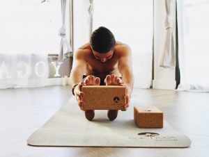 yogi-practicing-with-corc-yoga-products-yoga-pose-with-cork-block
