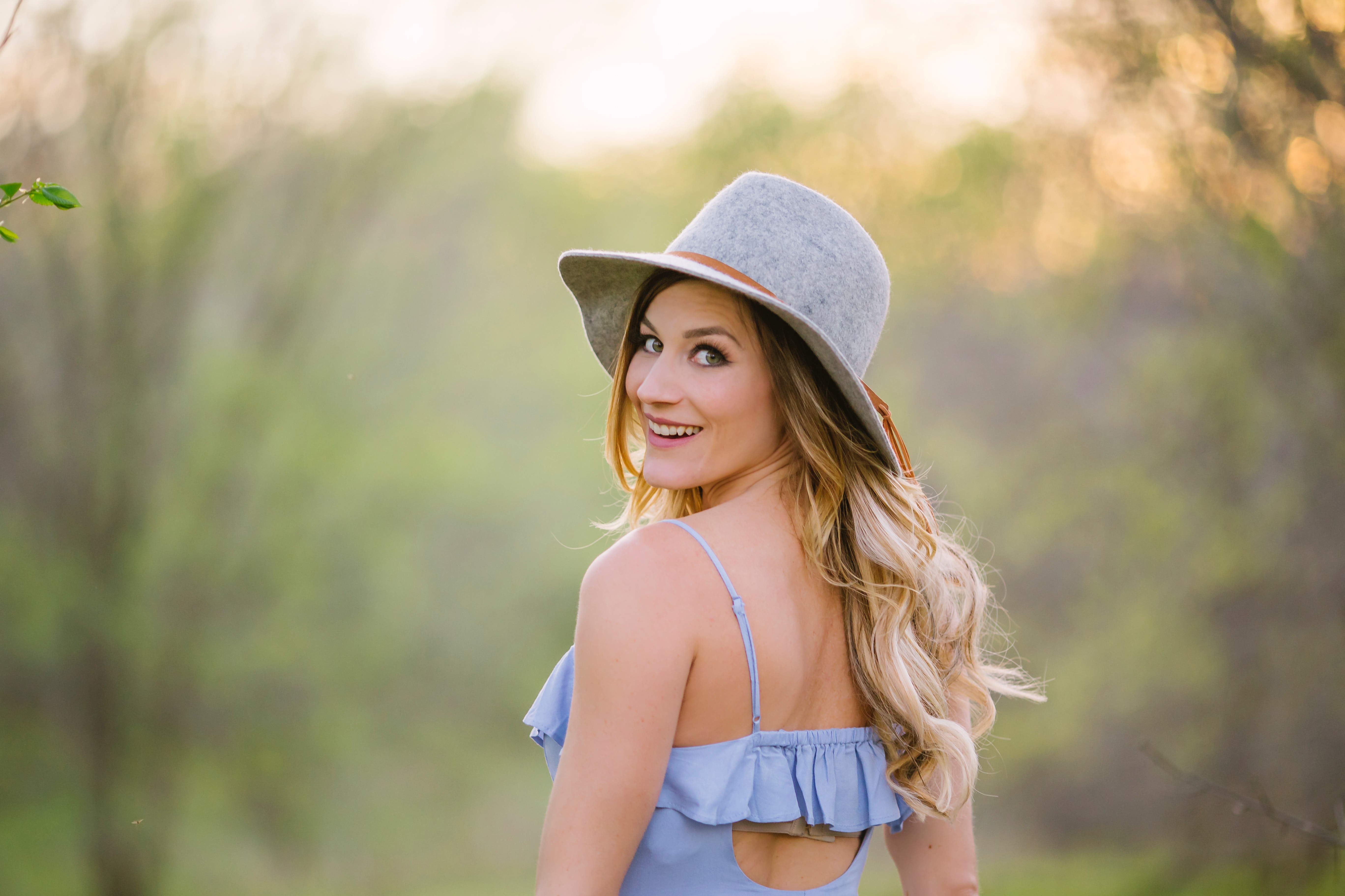 woman-in-hat-and-dress