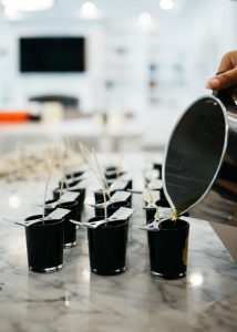lesruches-candles-being-made-small-batch-candles-beeswax-being-poured-into-candle-votives