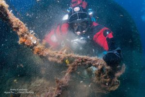 diver-collecting-samples-from-wreckage-site