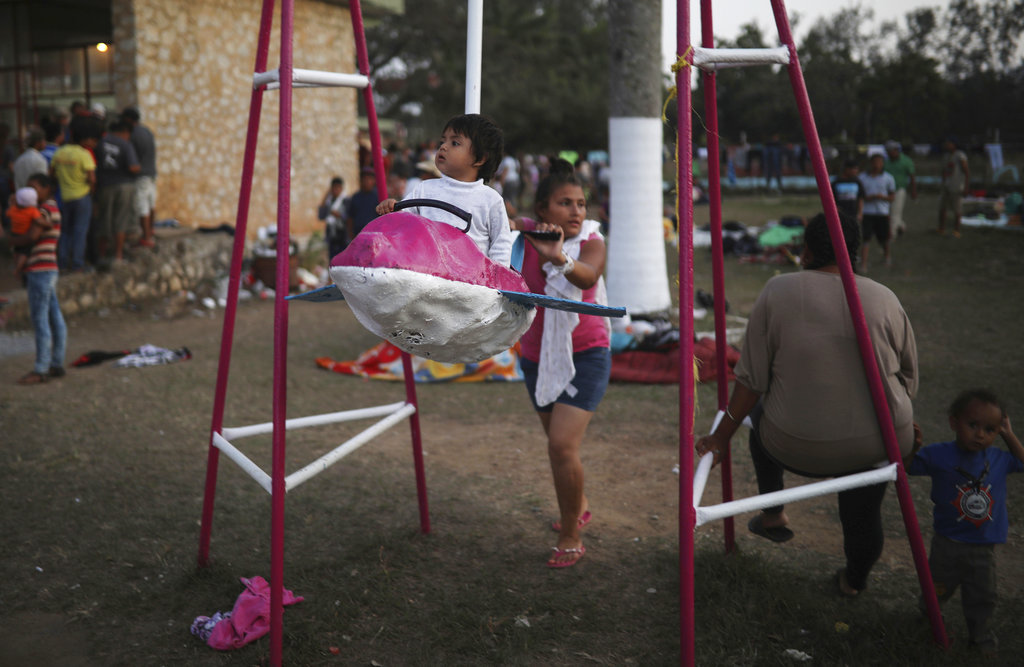 migrant caravan, raising concerns in us, halts in mexico