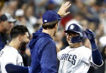 Padres get 1st win of 2018 beating Rockies 8-4