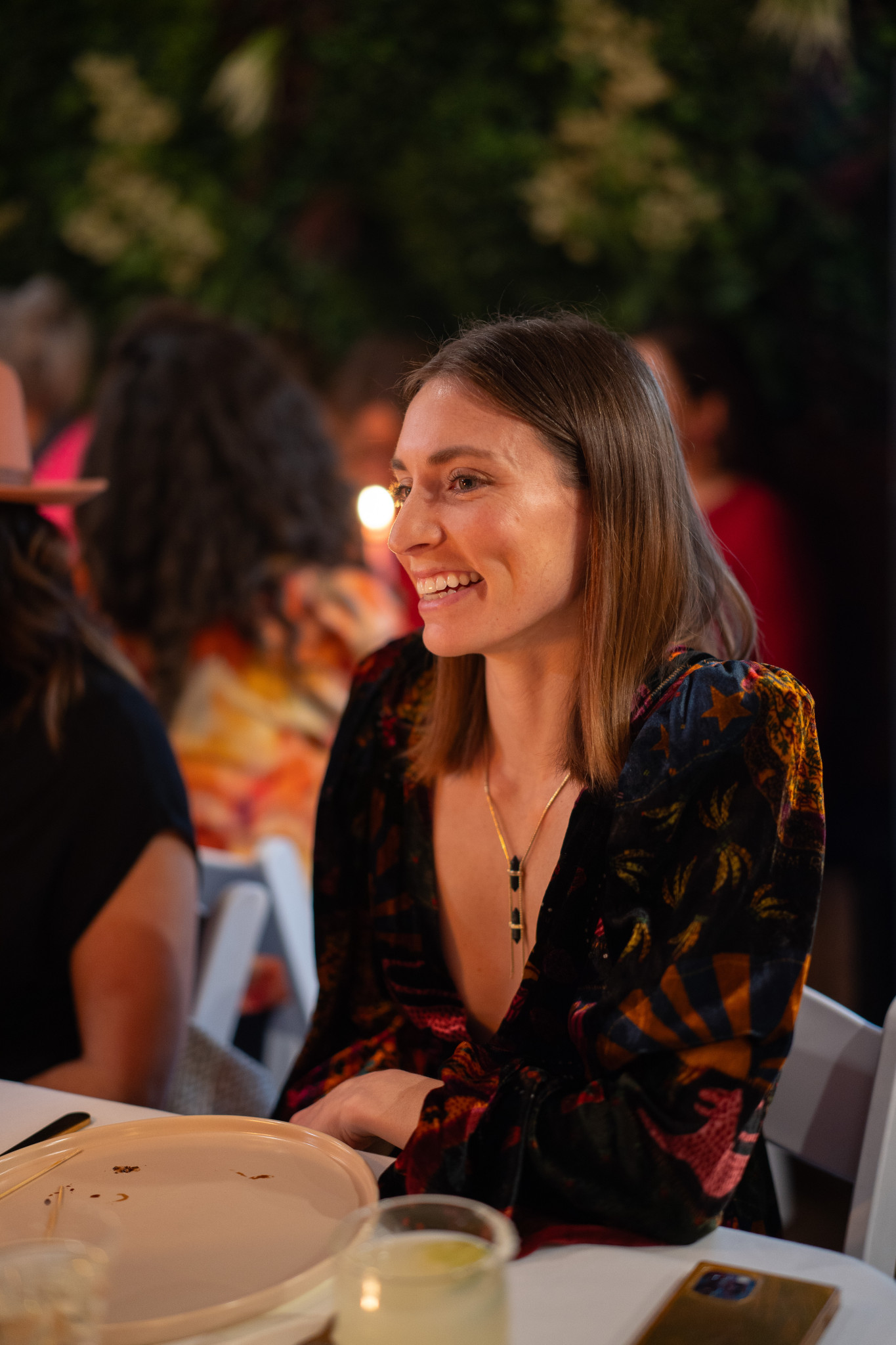 person at dinner in conversation