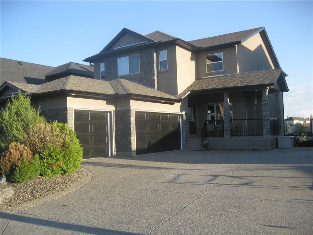 174 Crystal Shores Drive, Okotoks, AB, T1S 2B7 C4189390 Andrea