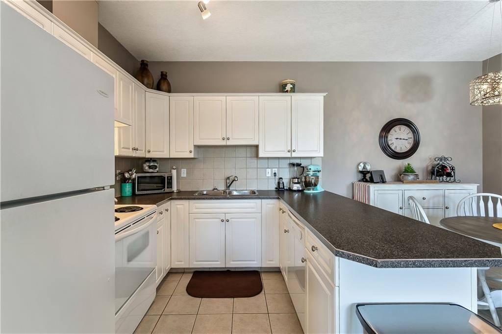 104 149 McRae Street, Okotoks, AB, T1S 1A5 C4241774 Chris Podesky