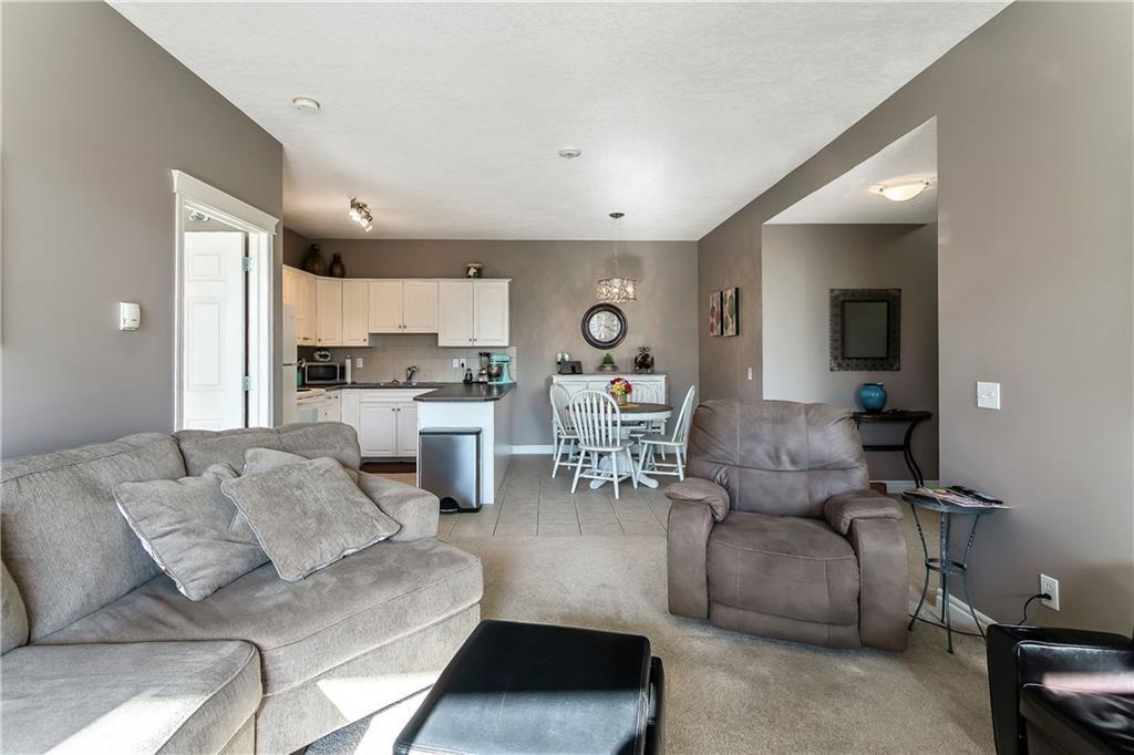 104 149 McRae Street, Okotoks, AB, T1S 1A5 C4241774 Chris Podesky