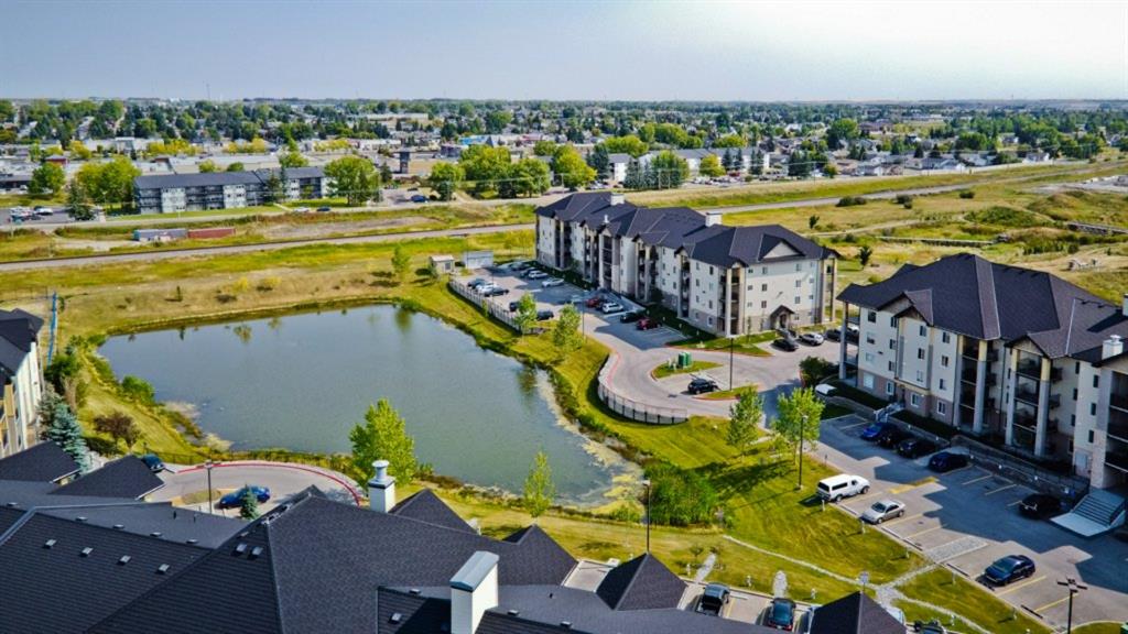 7410 304 Mackenzie Way SW, Airdrie, AB A1032101 Carey Rose