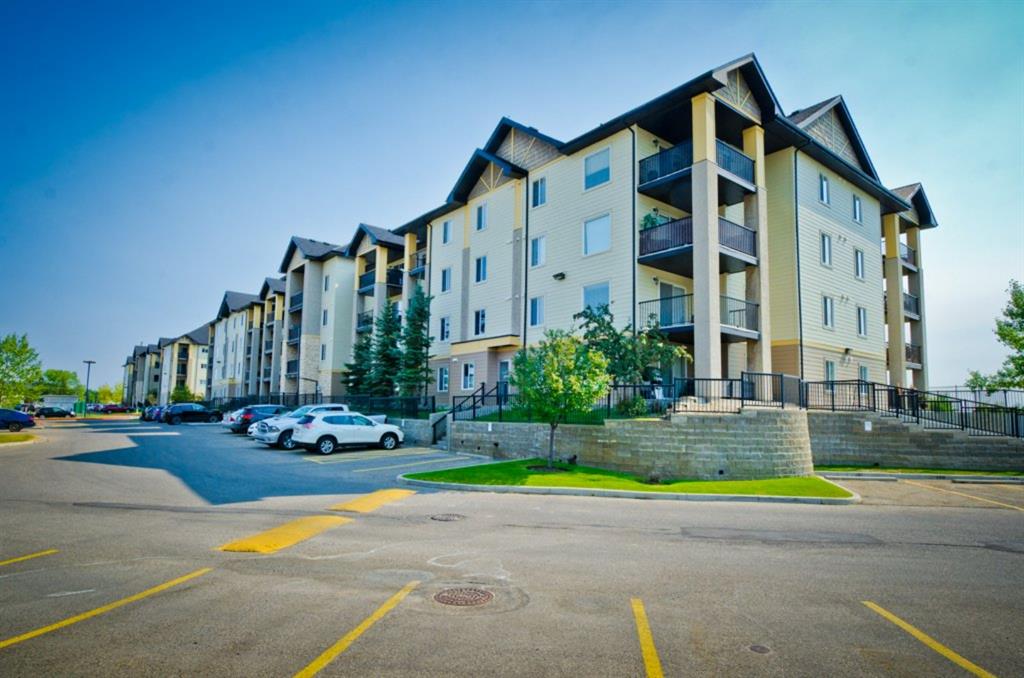 7410 304 Mackenzie Way SW, Airdrie, AB, T4B 3H7 A1032101 Carey Rose