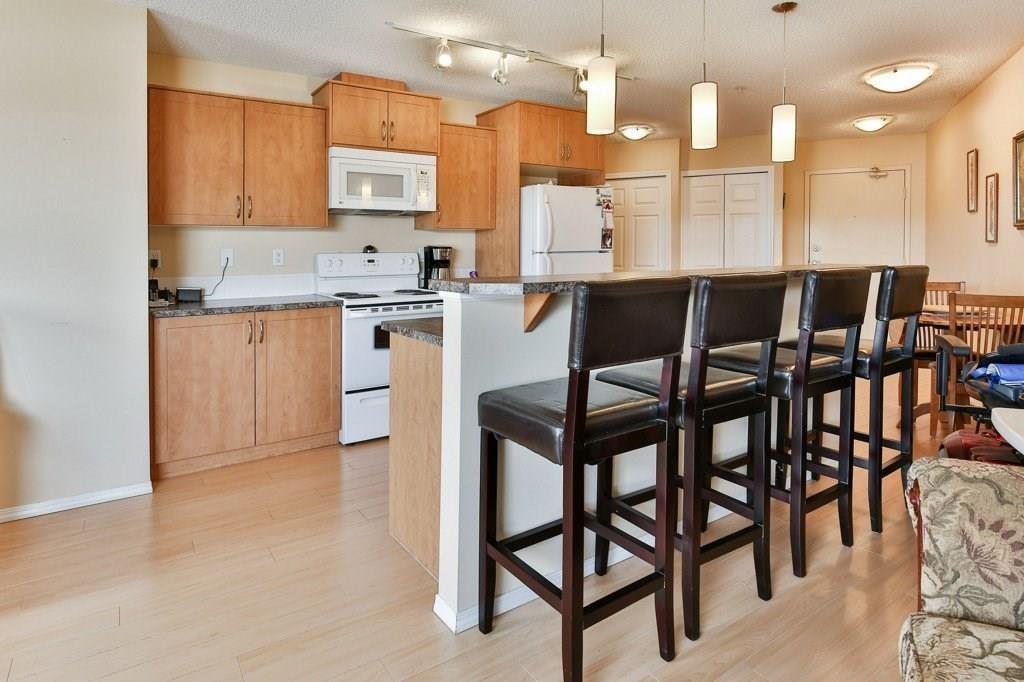 2221 700 Willowbrook Road NW, Airdrie, AB A1033546 Mari Carr Real