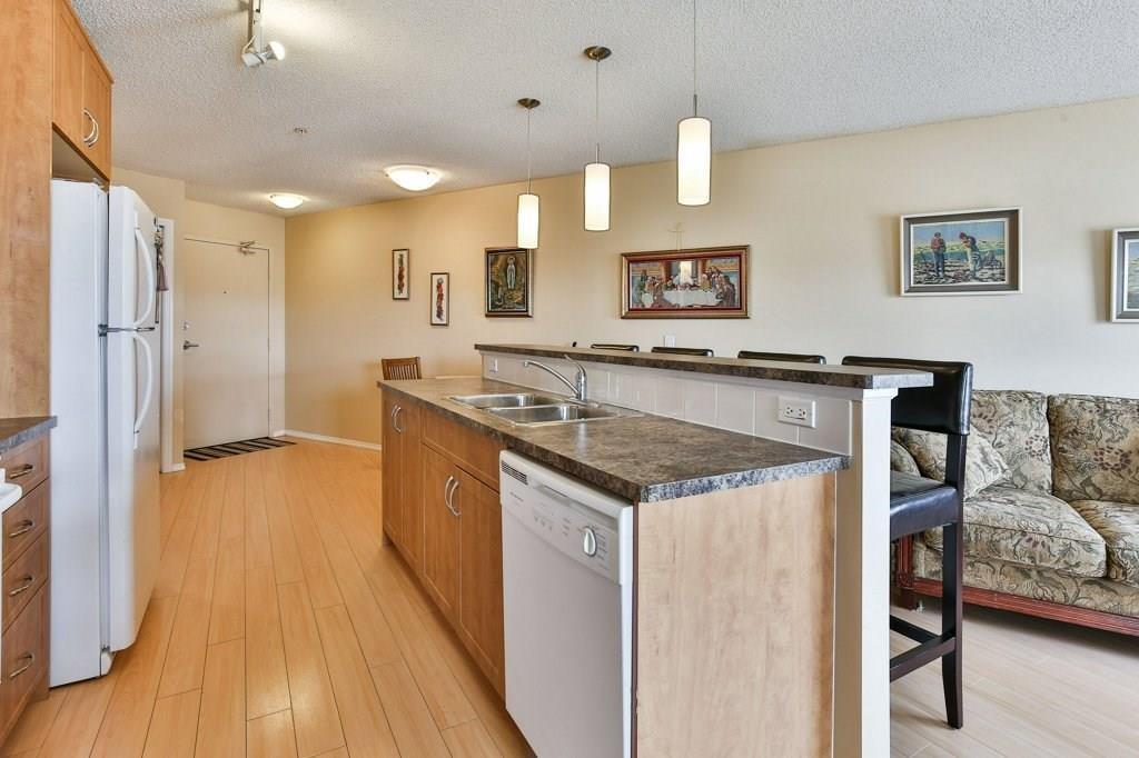 2221 700 Willowbrook Road NW, Airdrie, AB A1033546 Mari Carr Real Estate